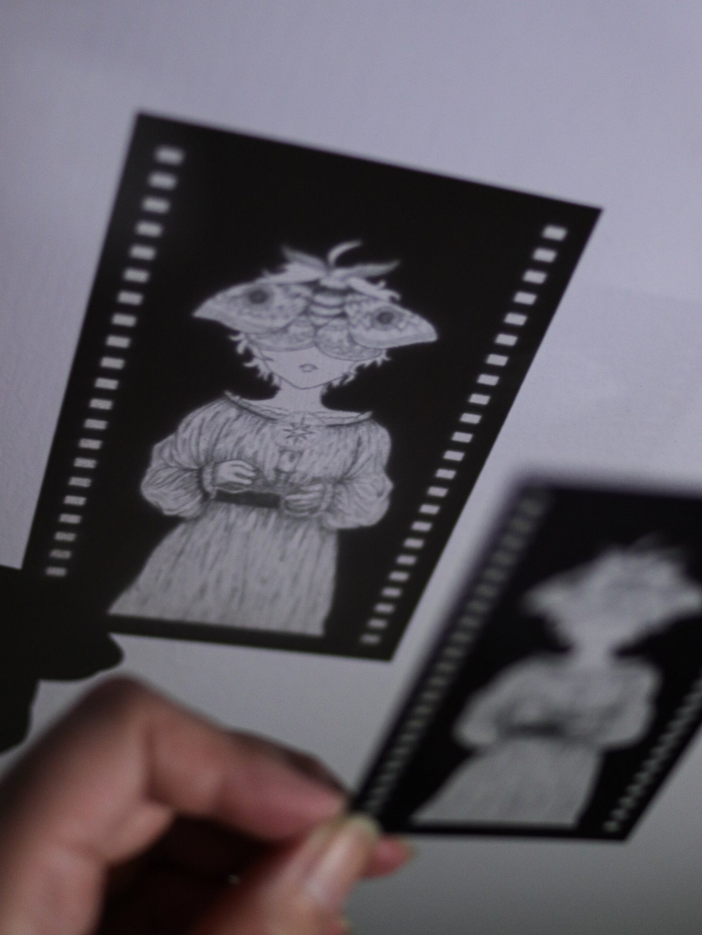 Film Style Plastic Card - Moth Girl (clear)